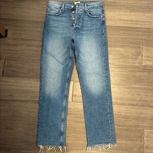 MOTHER Medium Wash Denim Jeans with Signature Pocket Design